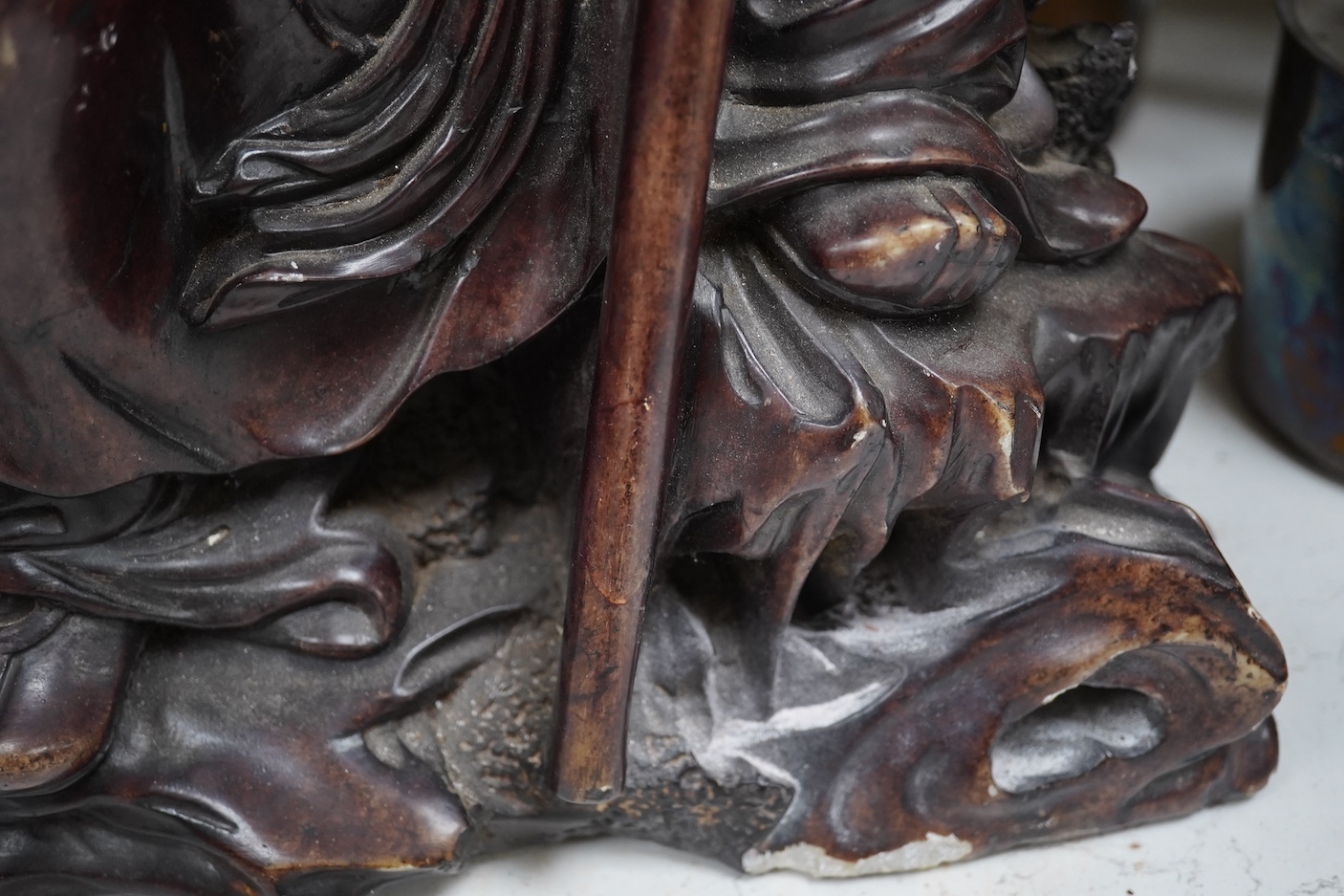 A large Chinese soapstone figure of an elder, 50cm high